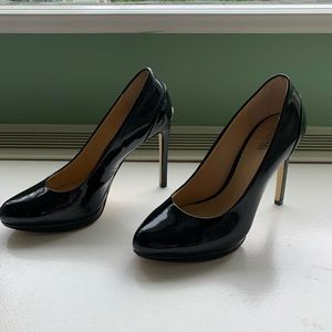 Black patent leather Michael Kors heels